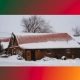 snow covered barn at new leaf